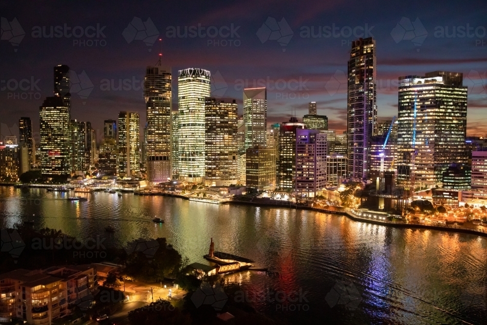 Looking over Brisbane River and the city from the Story Bridge at twilight. - Australian Stock Image