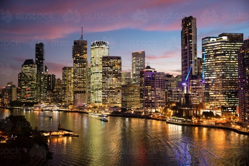 Looking over Brisbane River and the city from the Story Bridge at twilight. - Australian Stock Image