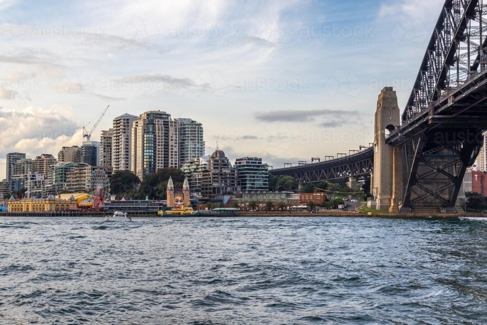 Looking over Sydney Harbour to Luna Park and Harbour Bridge - Australian Stock Image