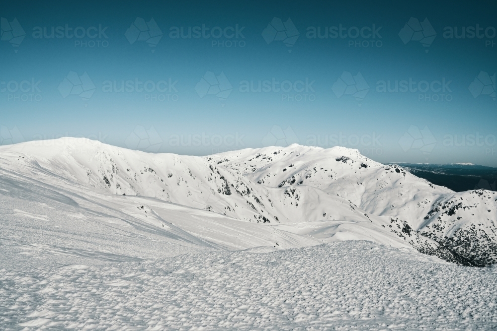 Looking over the snow covered Main Range valleys of Kosciuszko National Park - Australian Stock Image