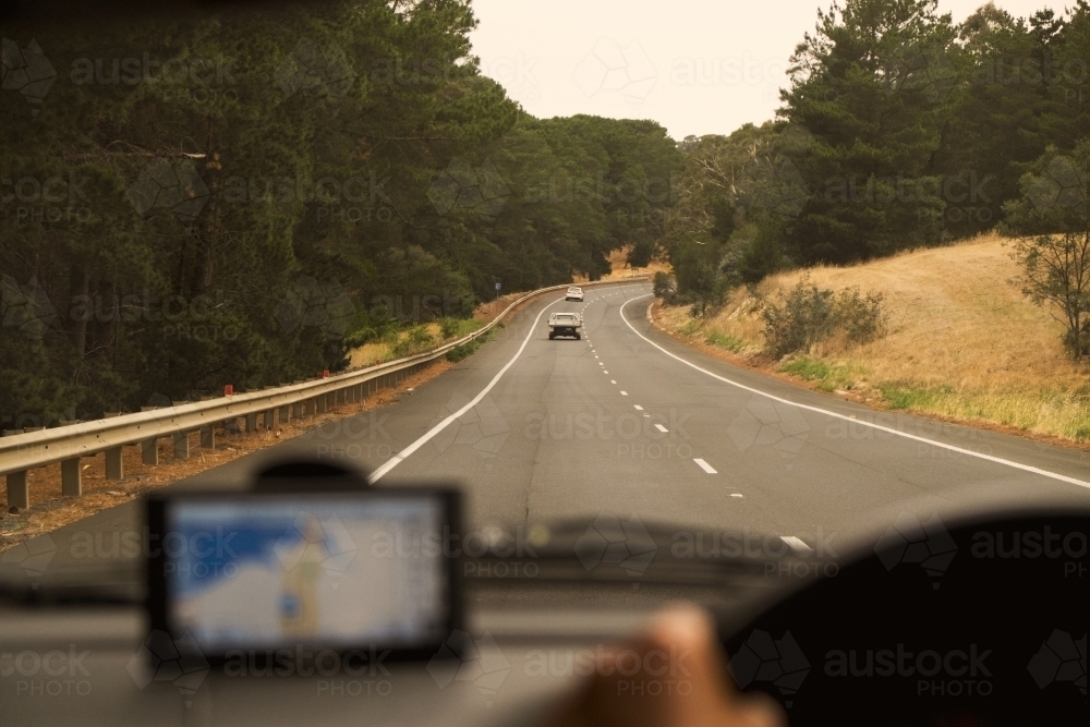 Looking through car front window on a road trip - Australian Stock Image