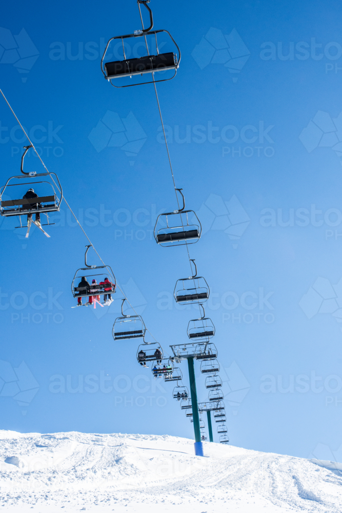 Looking up at chairlift in Mt Hotham ski resort - Australian Stock Image