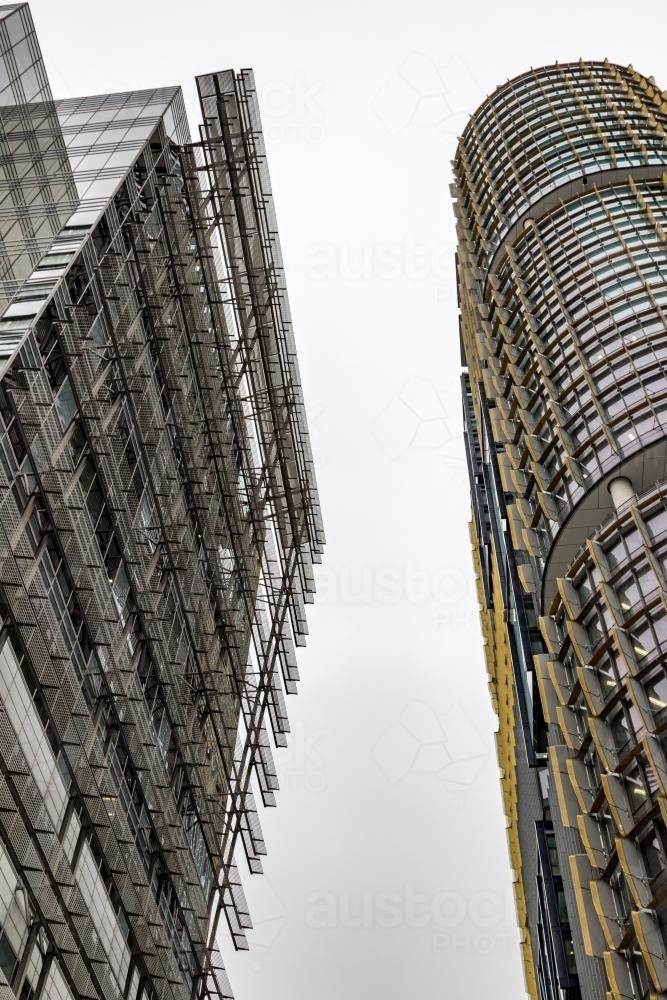 Looking up at City buildings on an overcast day - Australian Stock Image