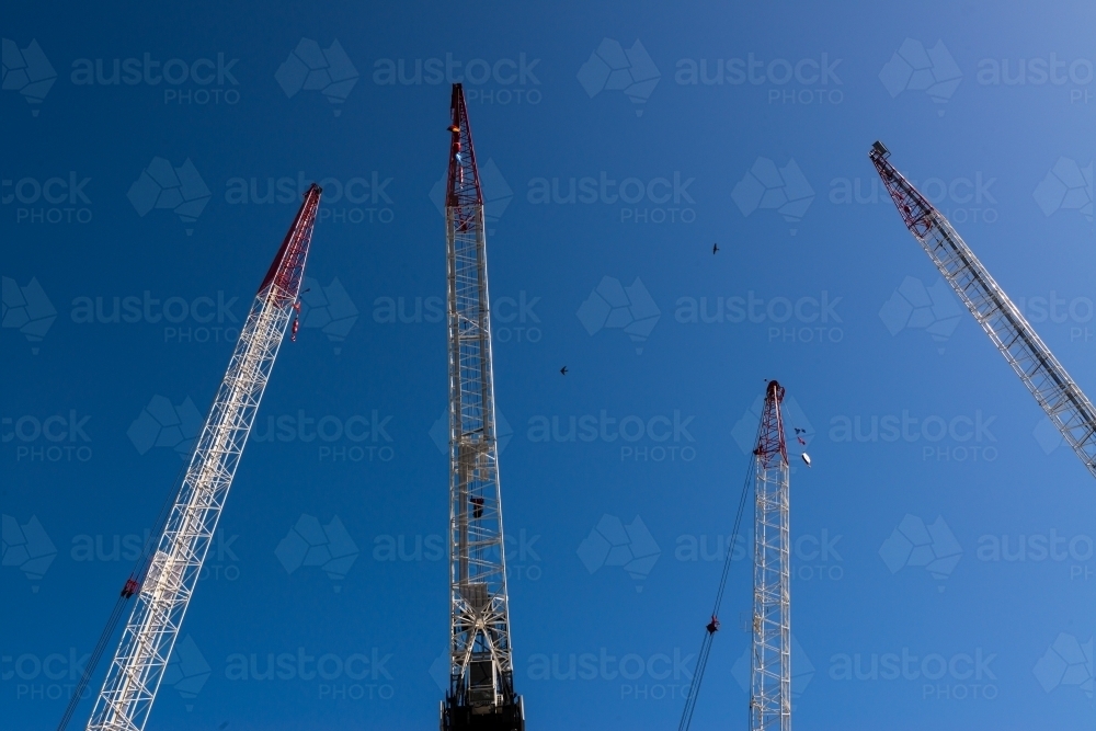Looking up at Tower Craine with blue sky - Australian Stock Image