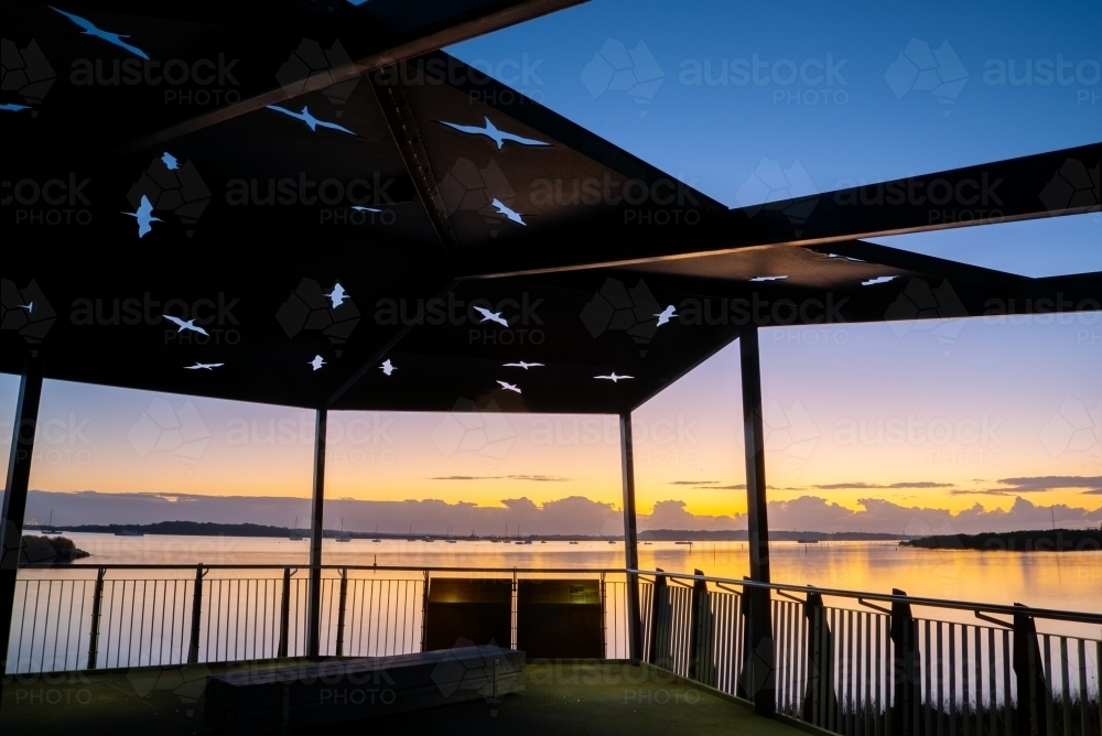 Lookout on bay walkway at blue hour, a little before sunrise - Australian Stock Image