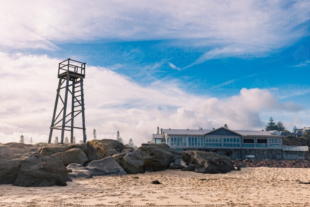 Lookout tower on Redhead Beach with Surf Club in background - Australian Stock Image
