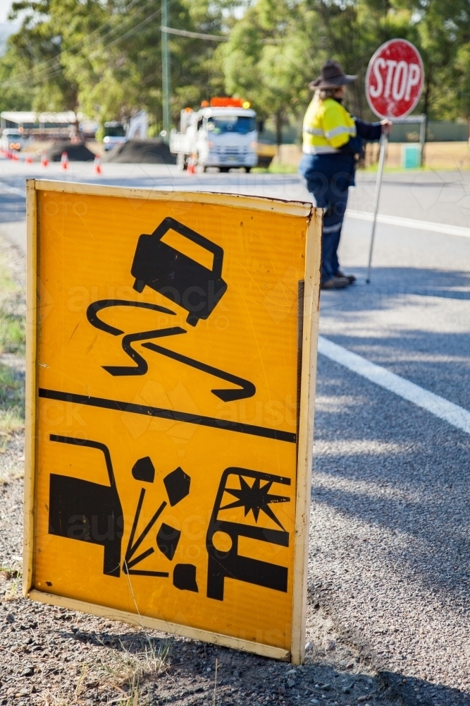 loose rocks sign before road work site - Australian Stock Image