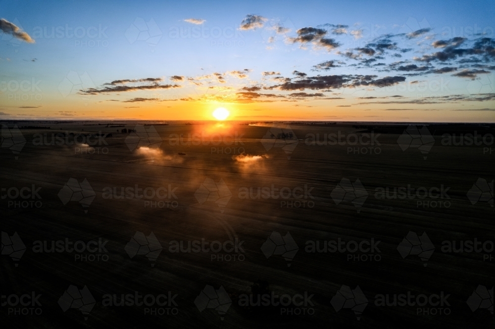 Low sunset over agricultural fields - Australian Stock Image