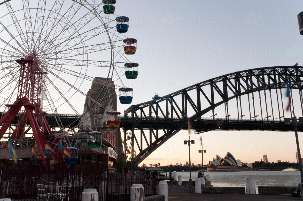 Luna Park ferris wheel and Sydney Harbour Bridge - Australian Stock Image