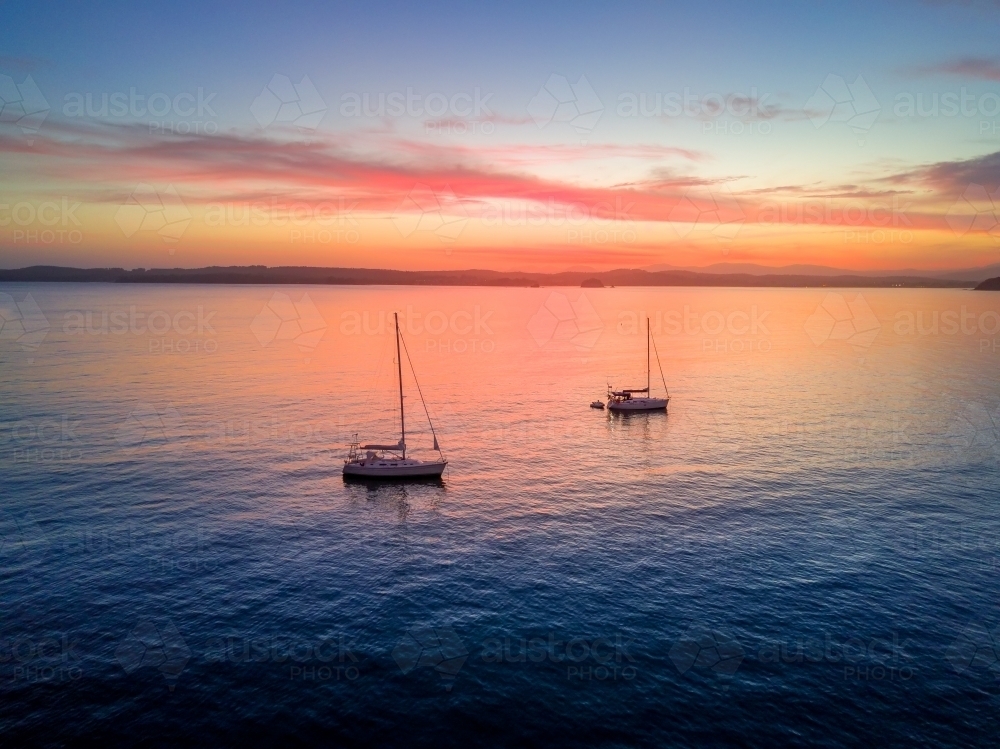 Luxury Yachts at sunset in Batemans Bay - Australian Stock Image