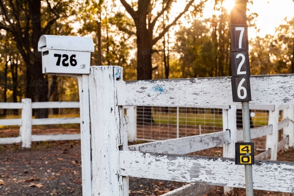 Mailbox and rural number posts with 726 address on farm fence - Australian Stock Image