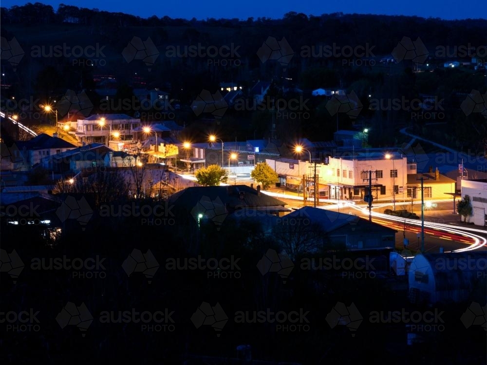 Main street of a country town at night from a distance - Australian Stock Image