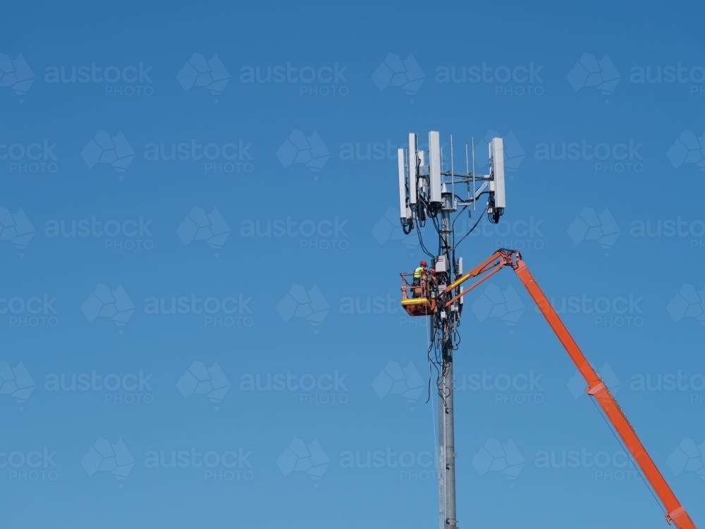 Maintenance on a mobile phone tower - Australian Stock Image