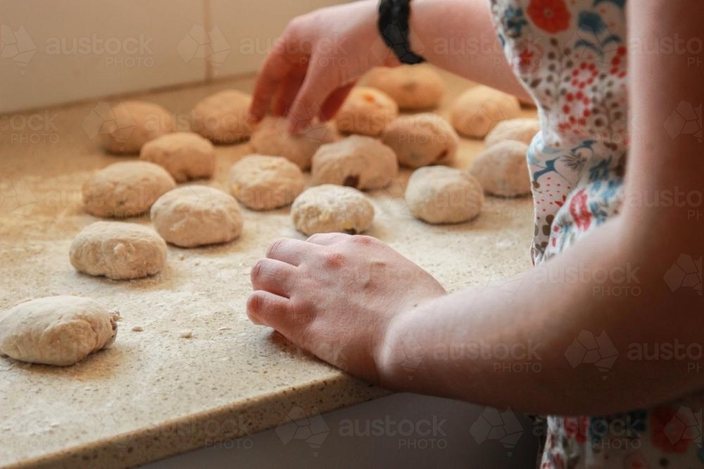 Making hot cross buns for Easter - Australian Stock Image