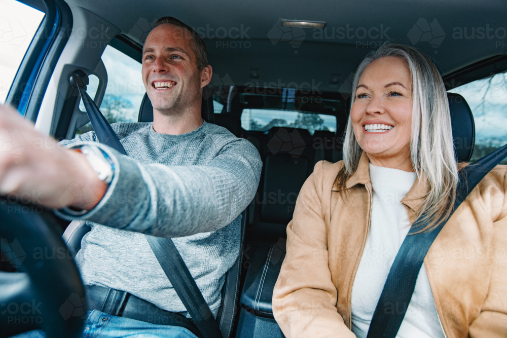 Man and woman travelling in a car together - Australian Stock Image