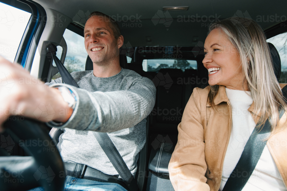 Man and woman travelling in a car together - Australian Stock Image
