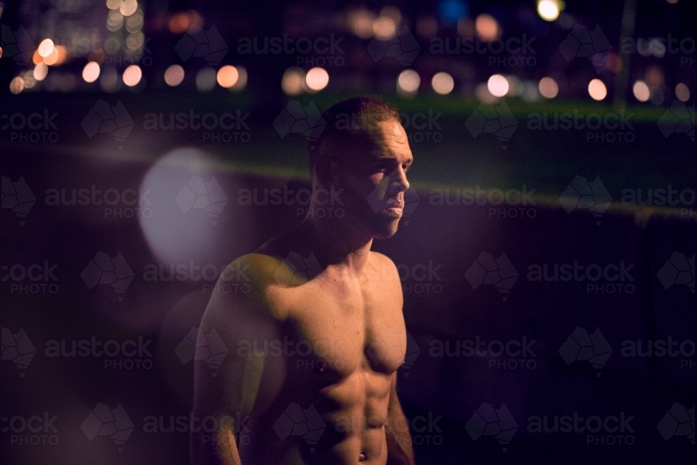 Man fitness training in urban setting - Australian Stock Image