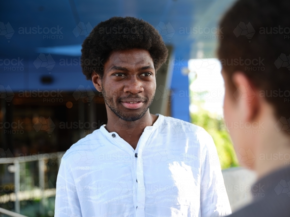 Man having a conversation outside - Australian Stock Image