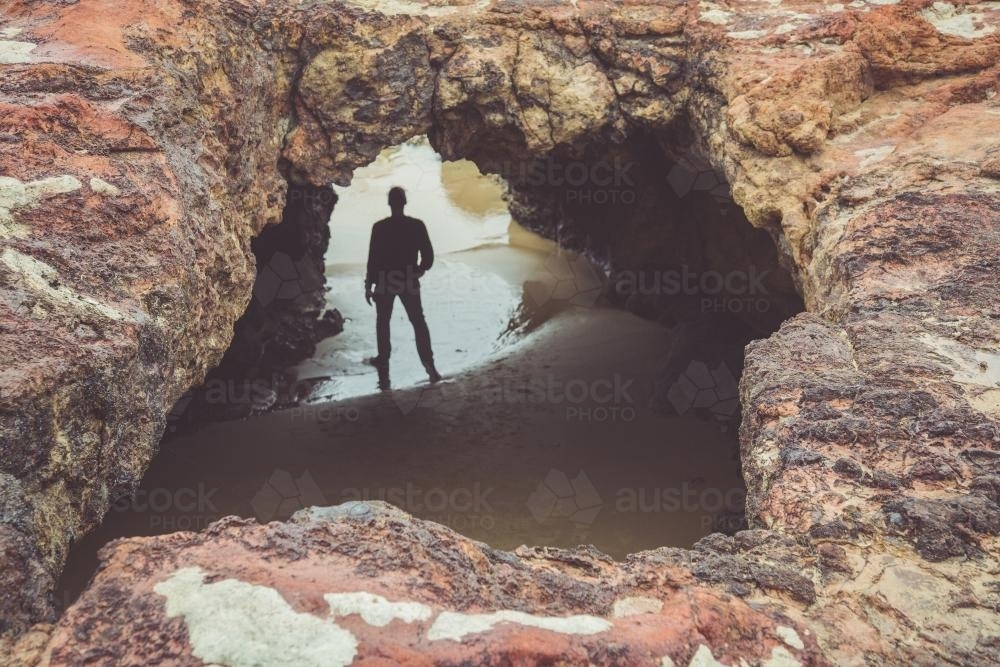 Man in Cave - Australian Stock Image