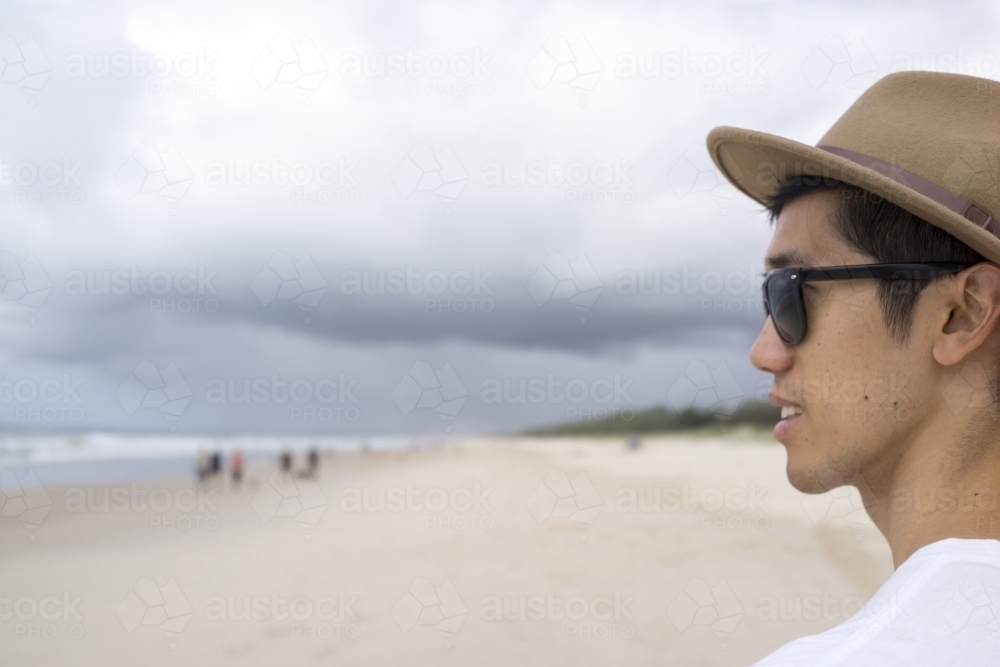 Man on beach - Australian Stock Image