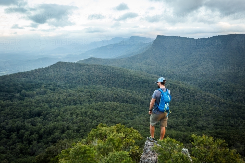 Man standing on Mountaintop - Australian Stock Image