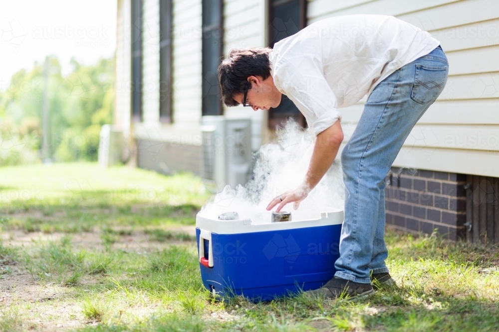 Man with esky full of dry ice making sparkling wine at vineyard in Hunter Valley - Australian Stock Image