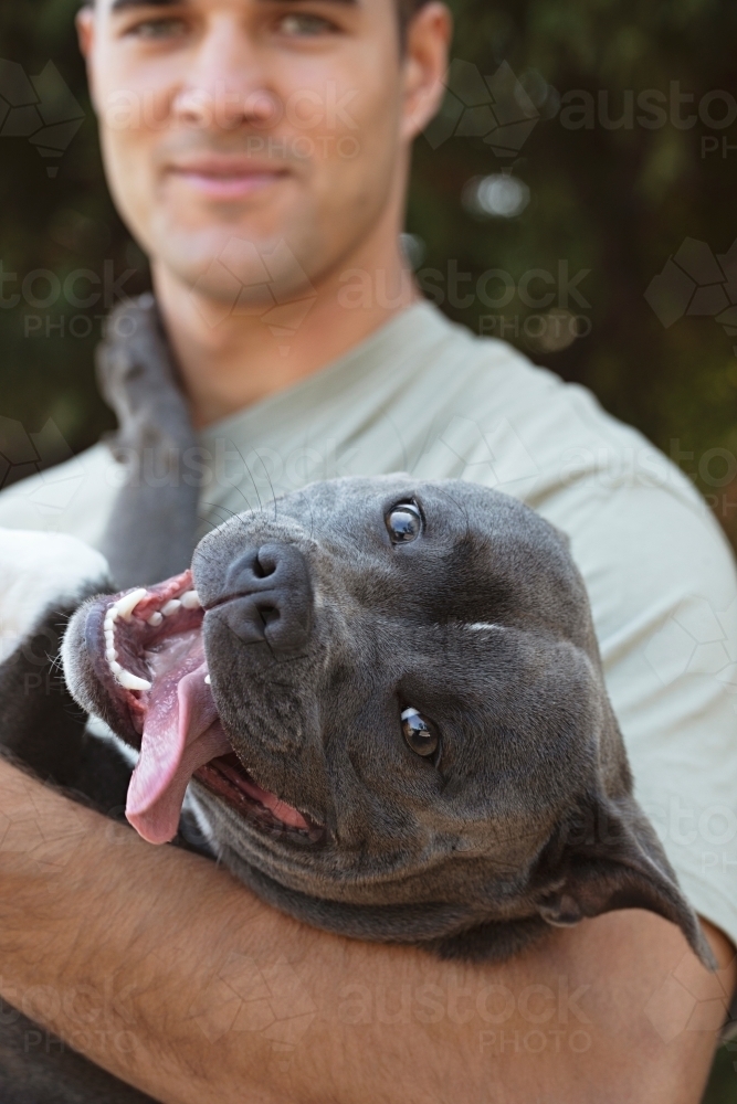 Man with his pet dog - Australian Stock Image