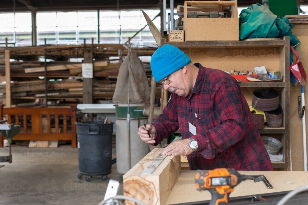 Man working at a Men's shed. - Australian Stock Image