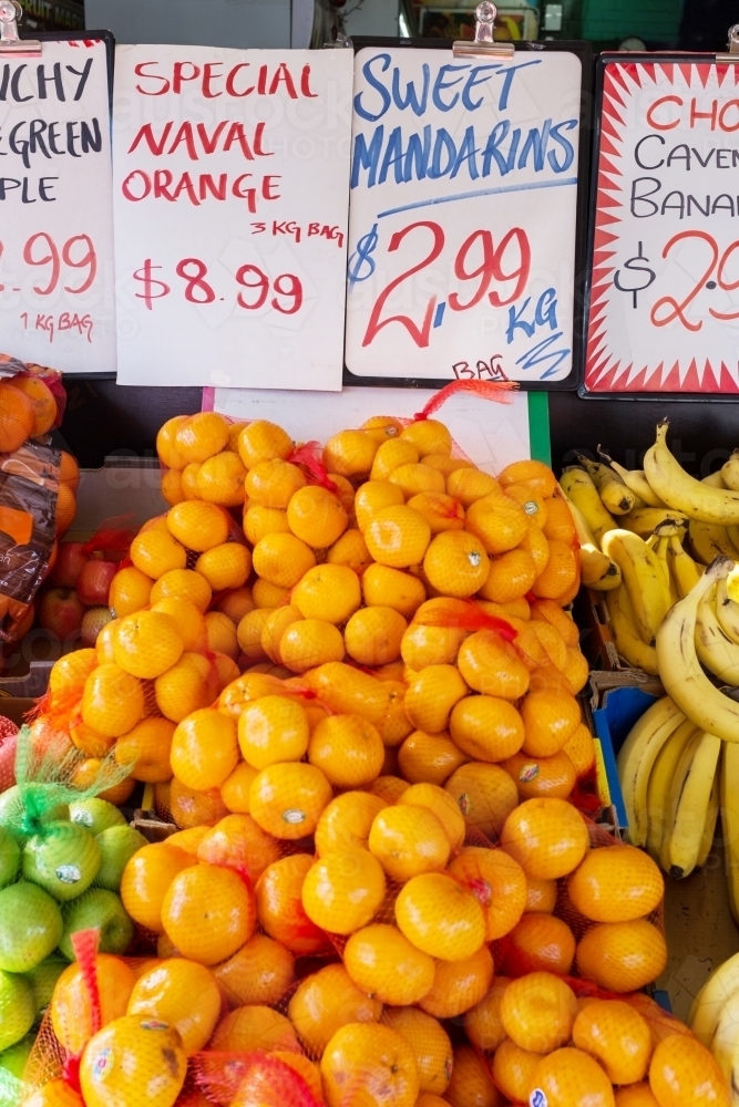mandarins and other fruits in a fruit shop - Australian Stock Image