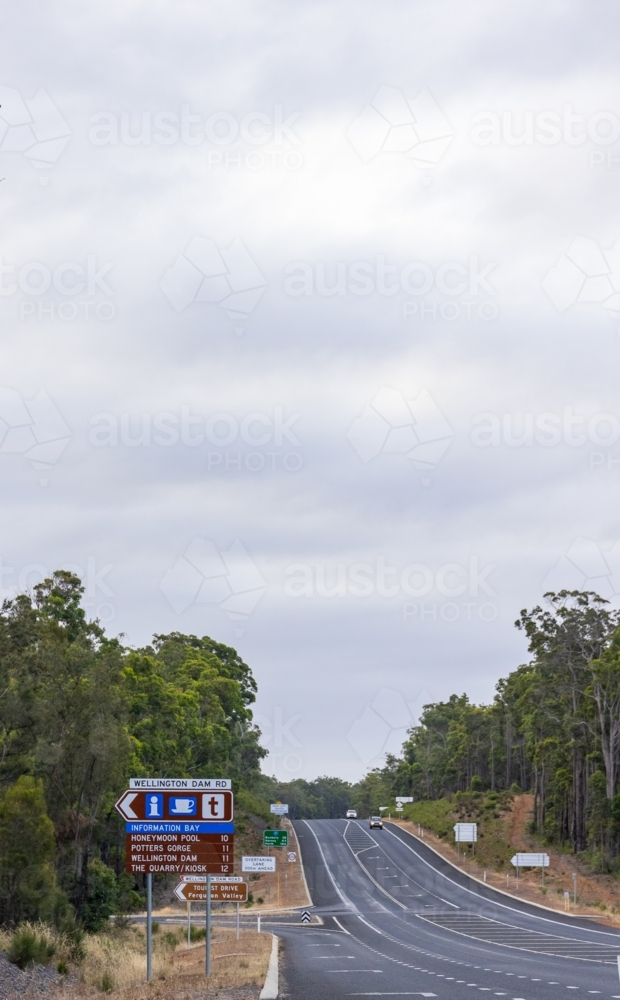 many signs on the highway at tourist attraction turn-off - Australian Stock Image