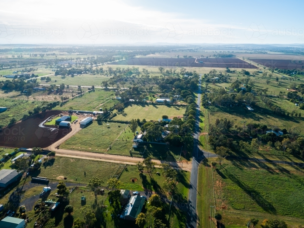 Many small properties with farm paddocks in good season showing green winter grass in Australia - Australian Stock Image