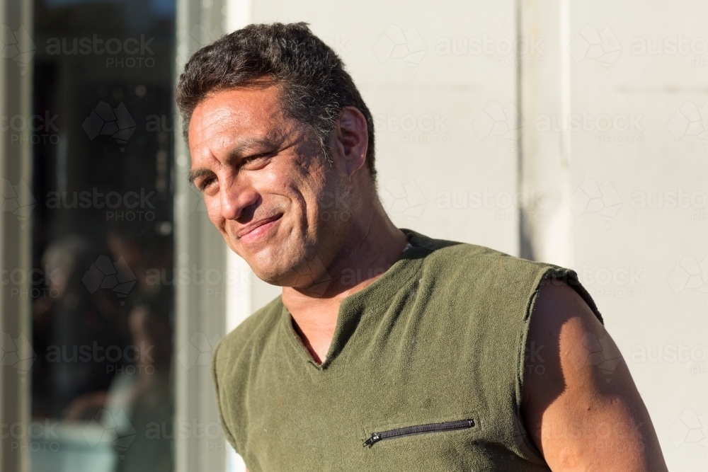 Maori man head and shoulders outside in the sun - Australian Stock Image