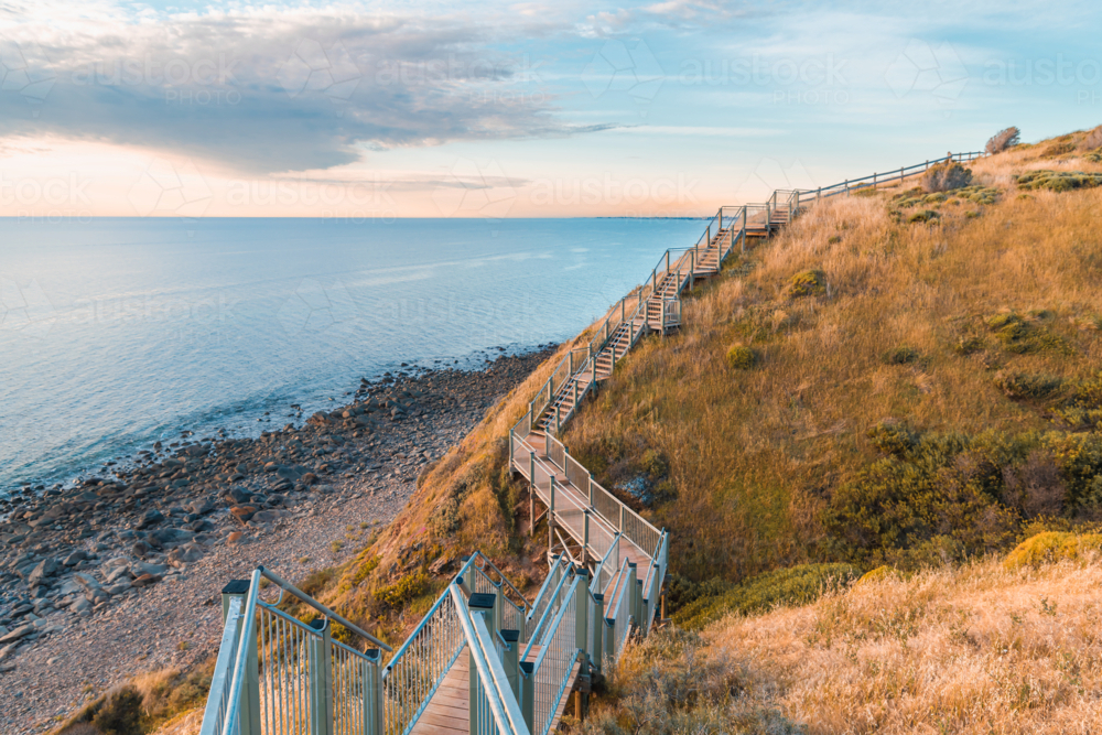 Marion to Hallett Cove Coastal Walking Trail with sea view at sunset, South Australia - Australian Stock Image
