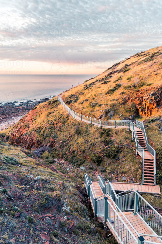 Marion to Hallett Cove Coastal Walking Trail with sea view at sunset, South Australia - Australian Stock Image