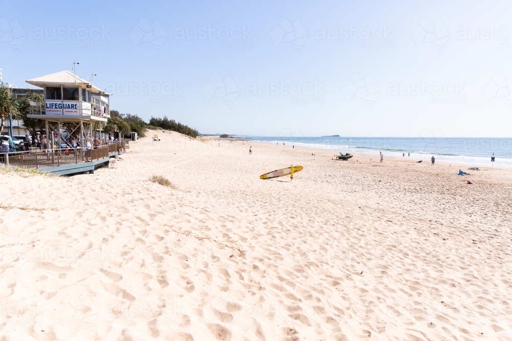 Maroochydore beach and lifeguard tower on sunlit day - Australian Stock Image