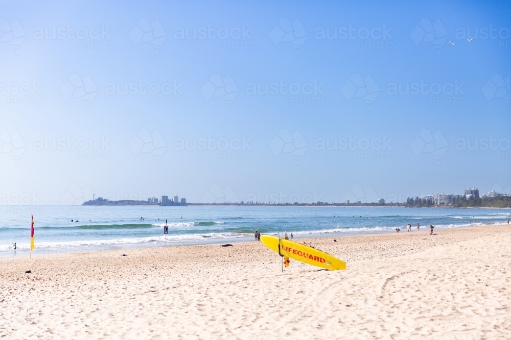 Maroochydore Beach looking towards Mooloolaba with surfboard - Australian Stock Image