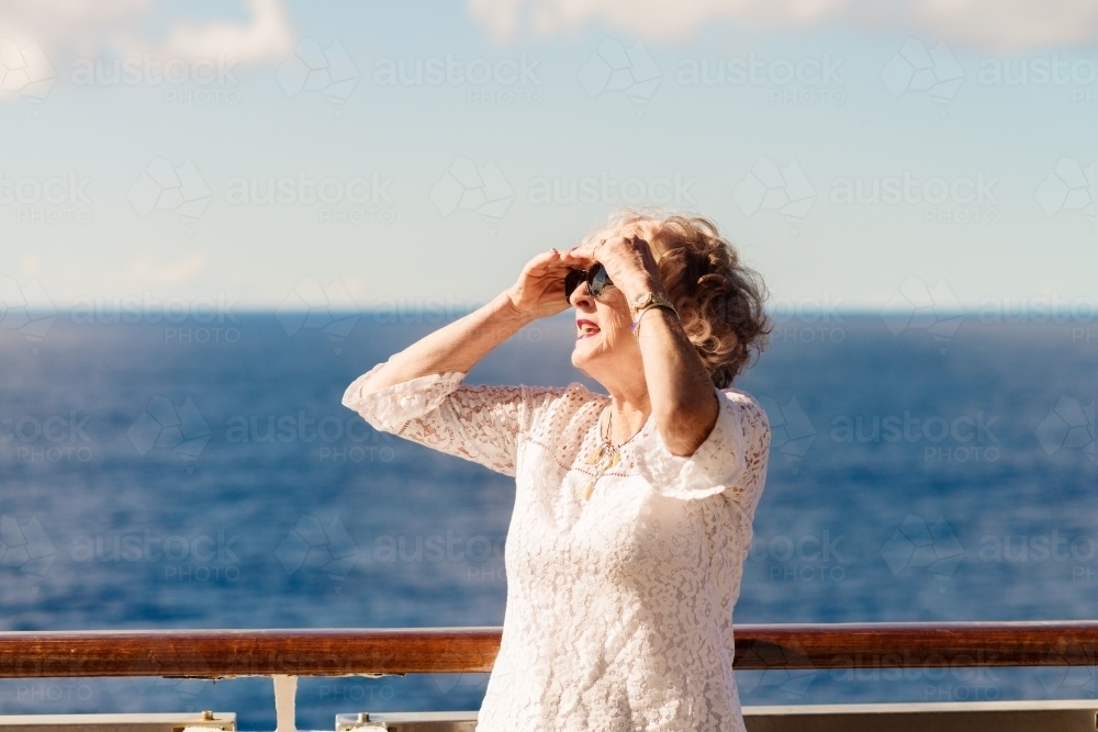 mature aged woman on a cruise - Australian Stock Image