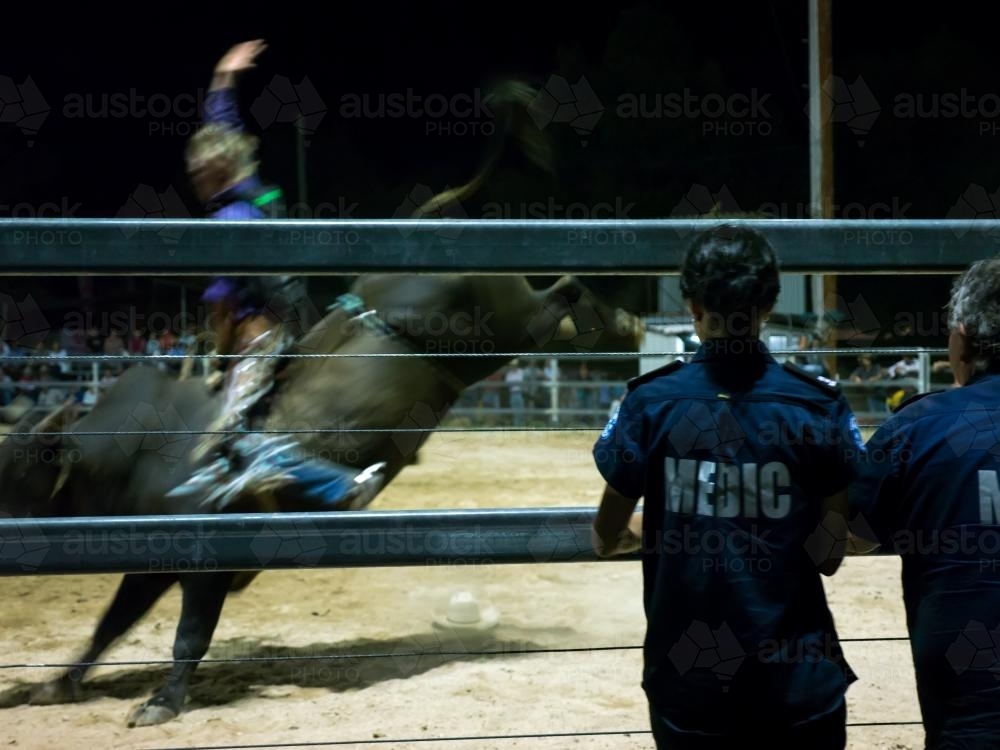Medics watching bull riding at the Walcha Show - Australian Stock Image