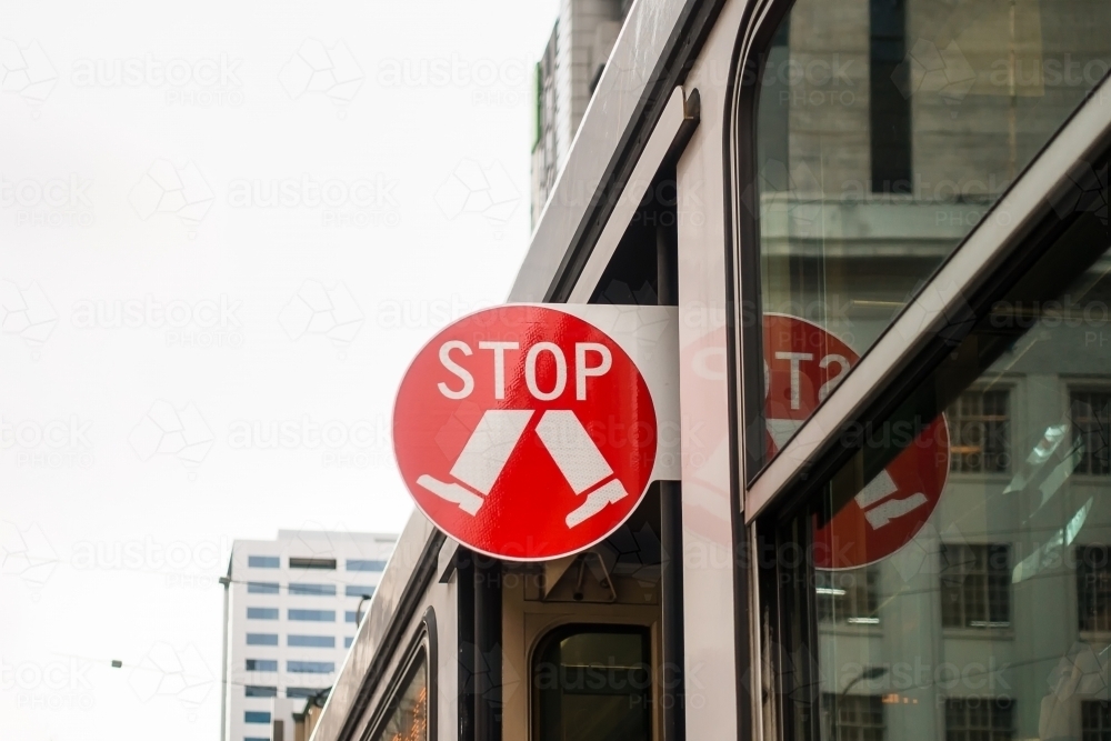 Melbourne, Australia - Aug 9, 2017: An extensile STOP sign on the tram. - Australian Stock Image