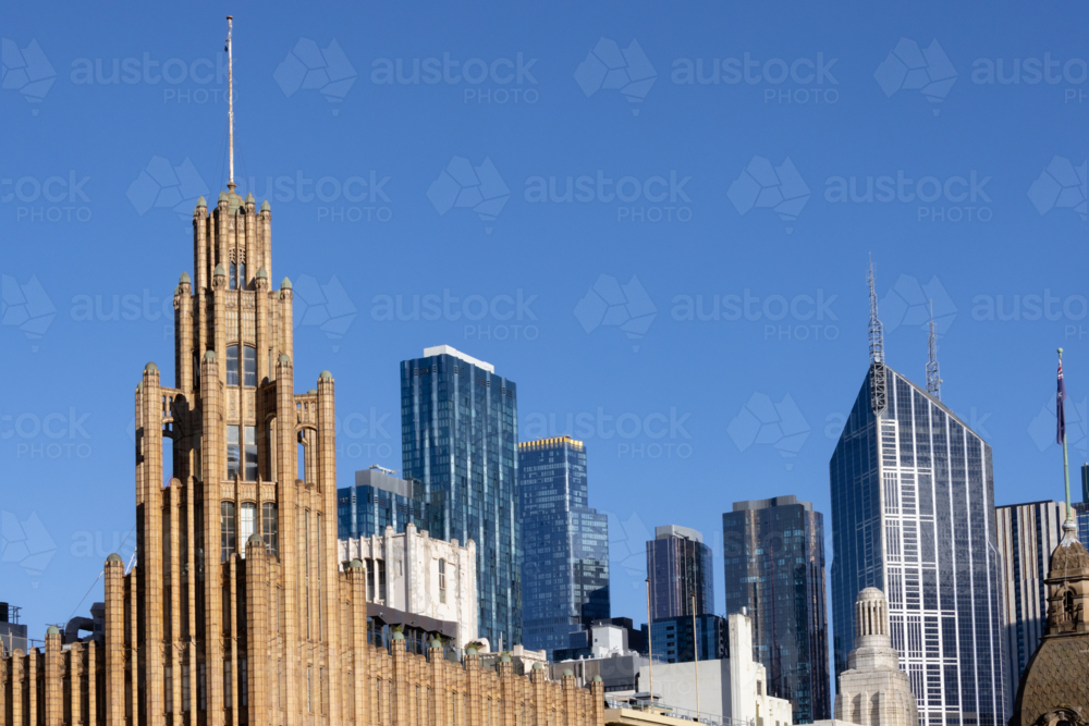 Melbourne CBD showing swanston street buildings and skyline - Australian Stock Image