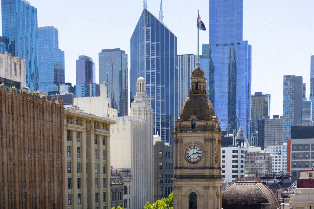 Melbourne CBD showing town hall clock tower, swanston street buildings and sky scrappers - Australian Stock Image