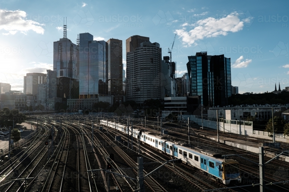 Melbourne Central Business District from Birrarung Mar with Train - Australian Stock Image