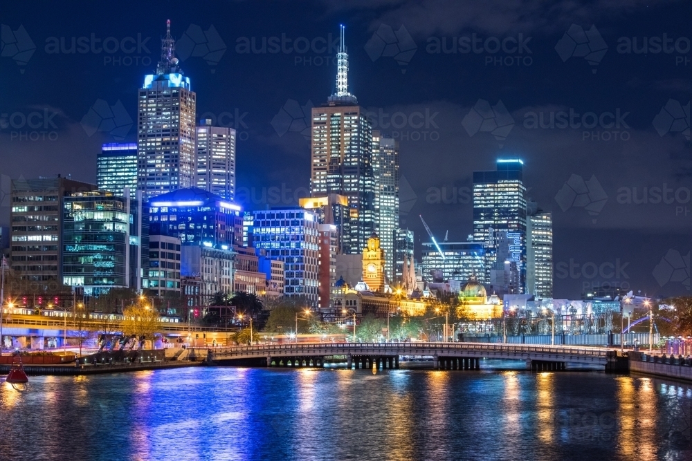 Melbourne City and Yarra River at night with lights shining - Australian Stock Image