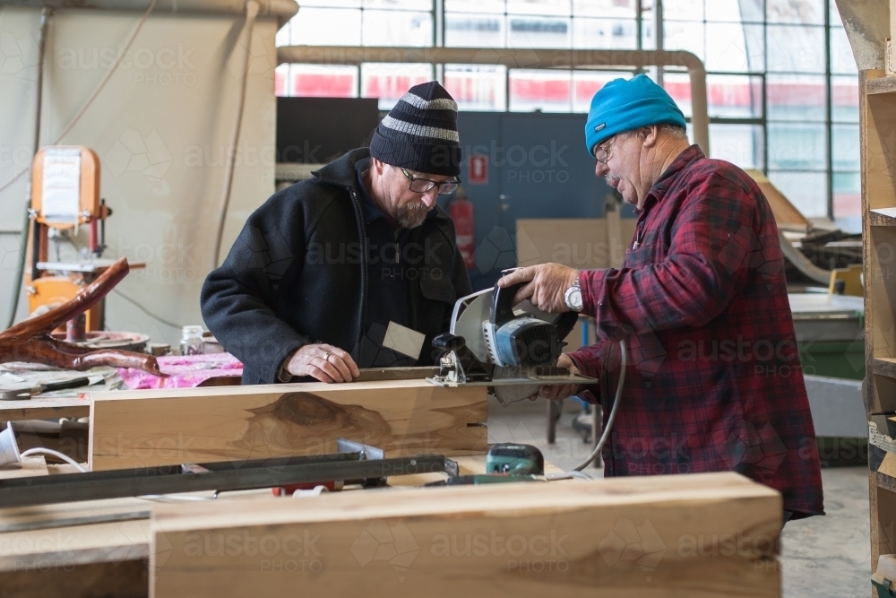 Men working on a project at a Men's Shed - Australian Stock Image