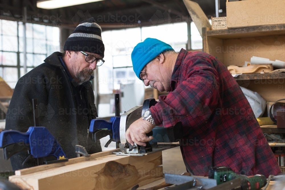 Men working on a project at a Men's Shed - Australian Stock Image