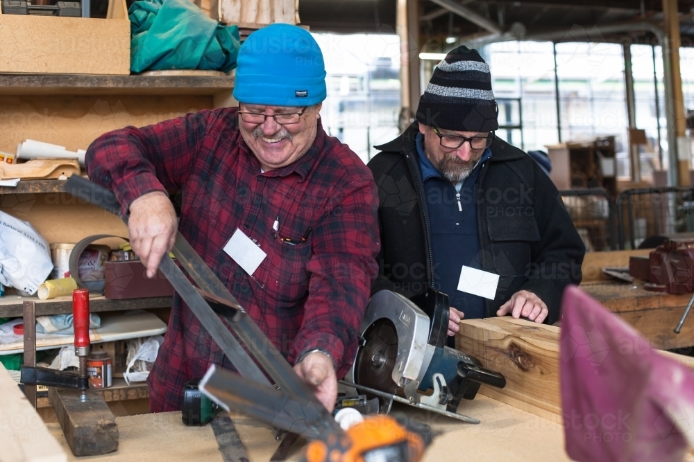 Men working on a project at a Men's Shed - Australian Stock Image