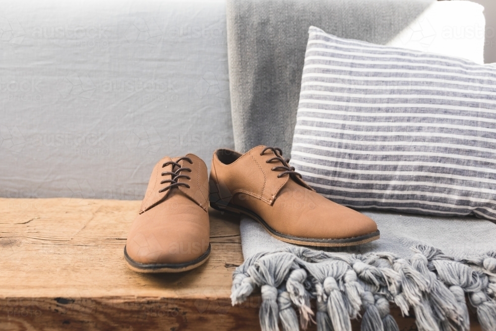 Mens Dress Shoes on Rustic Table - Australian Stock Image
