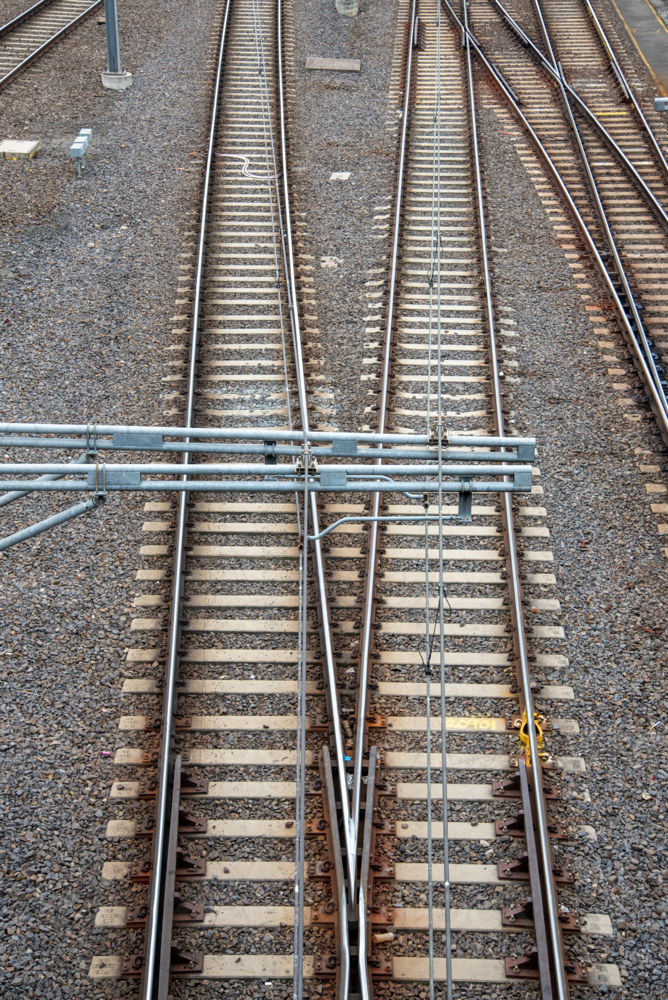 Merging train tracks as seen from above - Australian Stock Image