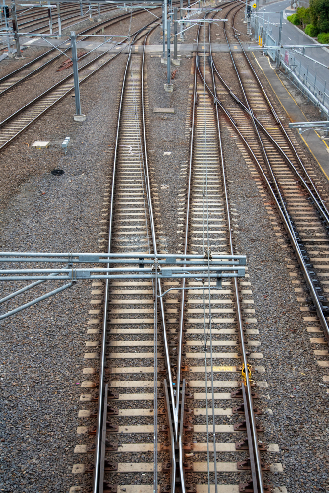 Image of Merging train tracks as seen from above - Austockphoto