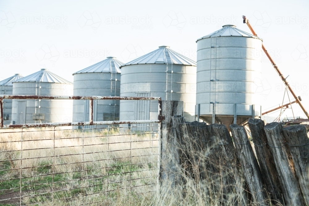 Metal grain silos on a farm - Australian Stock Image